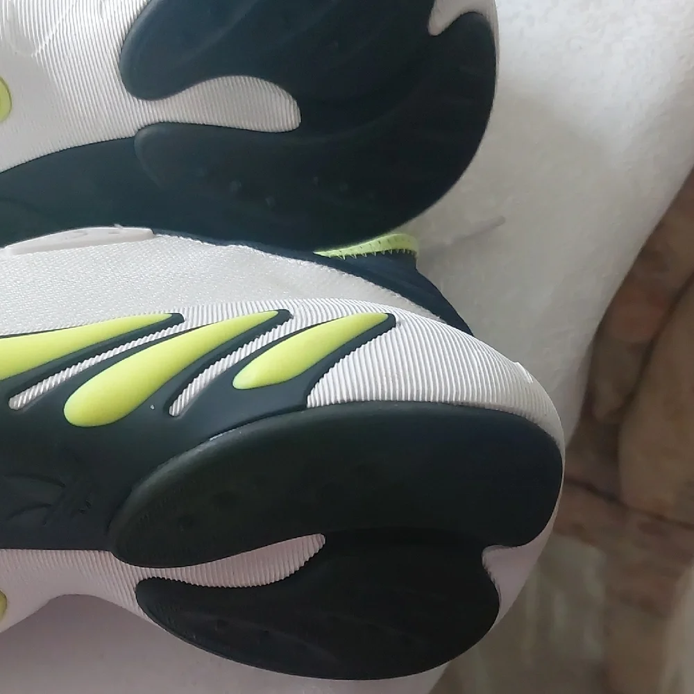 Adidas Adifom SLTN shoes in the Cloud White / SolarYellow / Blue Colorway